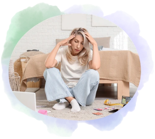 Photo d'une femme qui se tient la tête en signe de déséquilibre hormonal et qui correspond à la catégorie équilibre hormonal.